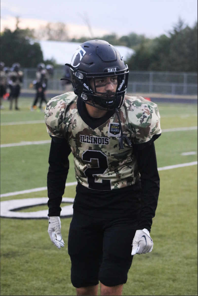 Emmanuel Isspeih (2) getting ready for his home game where he started safety